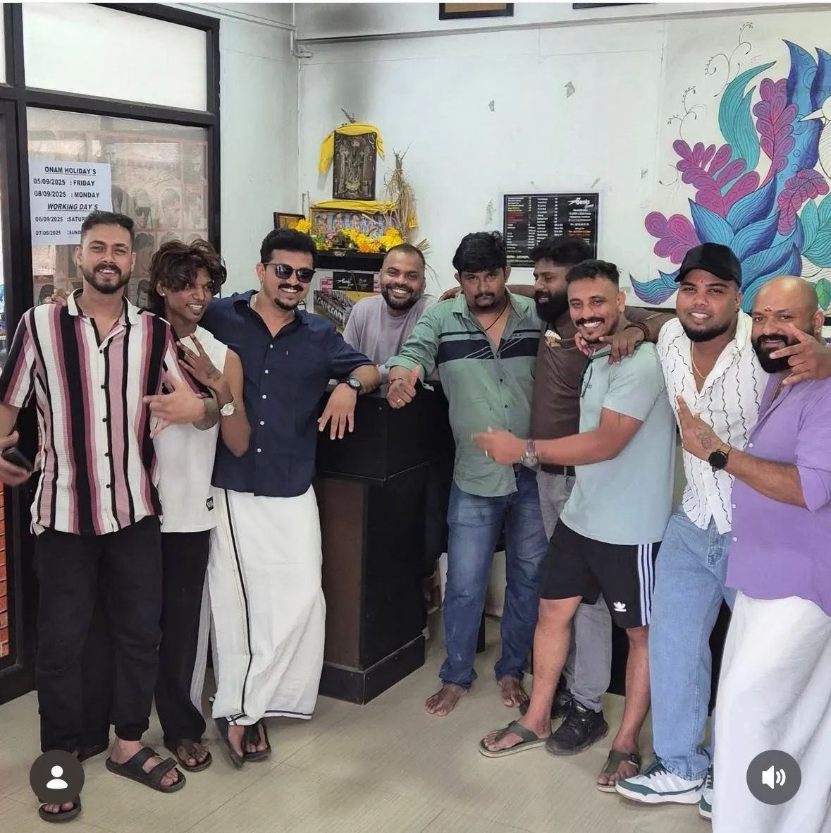 The Gents Camp team and customers in mundu at the shop during Onam